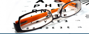 Glasses ontop of an eye test